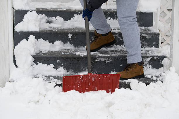 istock Shoveling snow in the winter 511210830