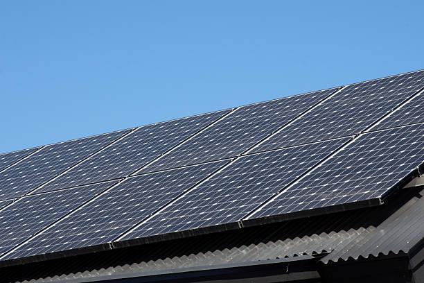 istock Solar panels on a metal pitched roof 511214718