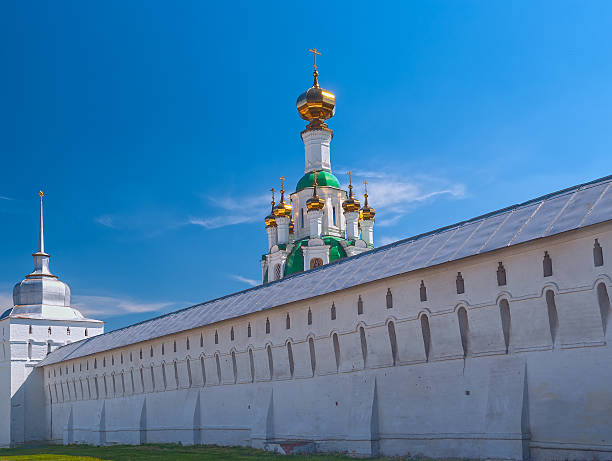 istock White  Ortodox monastery with gold domesl in sunny spring day 511215080