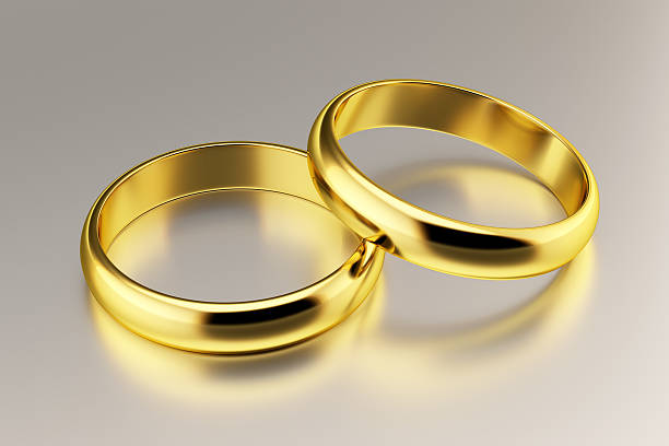 istock 3d render of golden rings isolated on white background 511216948