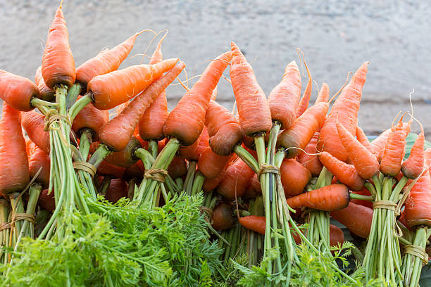 istock Fresh baby carrots 511218282