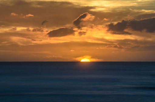 A long exposure photograph a the last light of a Kauai sunset
