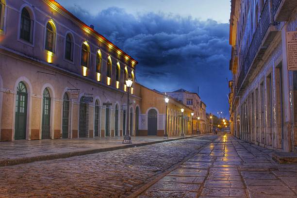 Old City Night image of the old city of San Luis town in Maranhao state, Brazil, with its lights and old architecture sao luis stock pictures, royalty-free photos & images