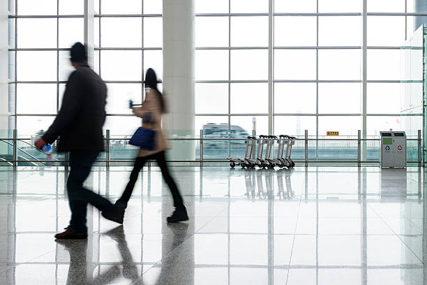 istock people silhouette in hall of office building 511239931