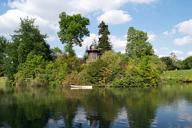 The Lac Inferieur (lower lake) in Paris' Bois de Boulogne on a tranquil afternoon.