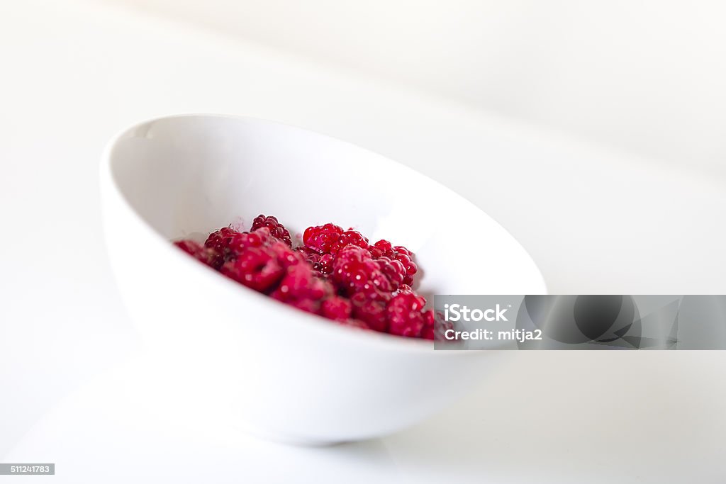 Raspberries Isolated raspberries in a bowl. Bowl Stock Photo