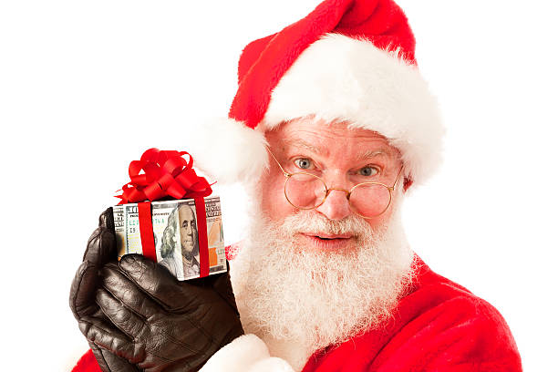 istock Happy Santa with Cash Present on White Background 511242907