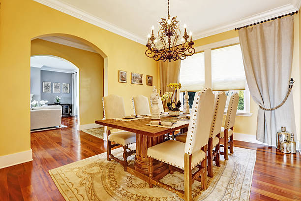 istock Luxury dining room with carved wood table 511242943