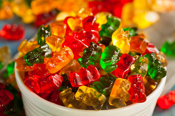 Colorful Fruity Gummy Bears Colorful Fruity Gummy Bears Ready to Eat gummi bears stock pictures, royalty-free photos & images