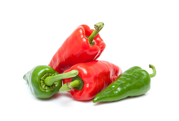 istock Vegetable: Red peppers and green peppers isolated on white background 511244911
