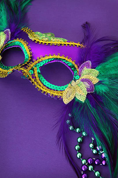 istock Carnival Mask and Beads on Purple 511245027
