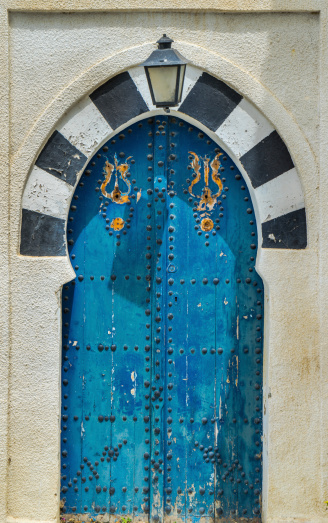 Old Blue door with arch from Sidi Bou Said in Tunisia