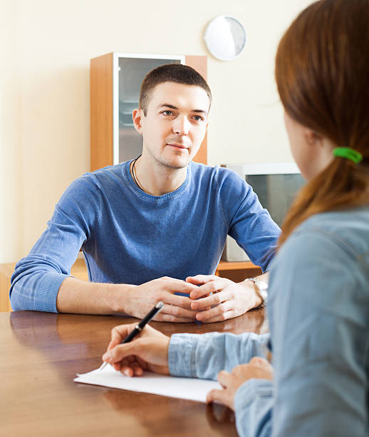 istock Man  filling questionnaire for employee 511277019