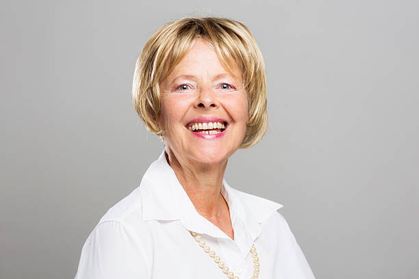 istock cheerful senior woman smiling 511277181