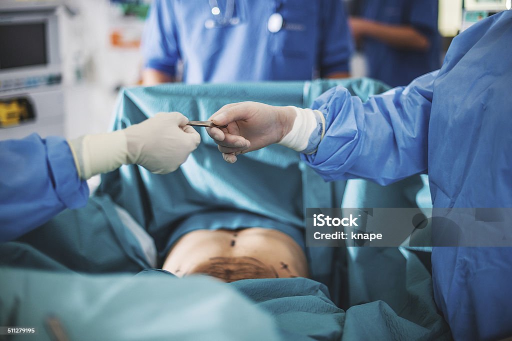 Doctor doing surgery Doctor surgery in operation room Adult Stock Photo