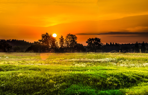 Emsworth, UK - June 8, 2021: Sunset over Peter Pond and Emsworth Mill, West Sussex, UK