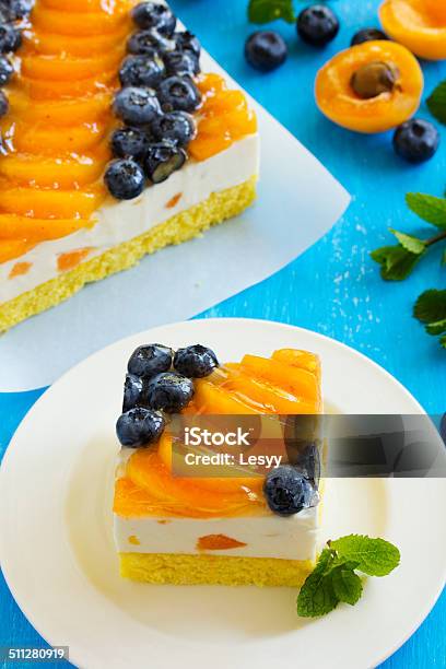 Sponge Cake With Yogurt Mousse Apricots And Blueberries Stock Photo - Download Image Now