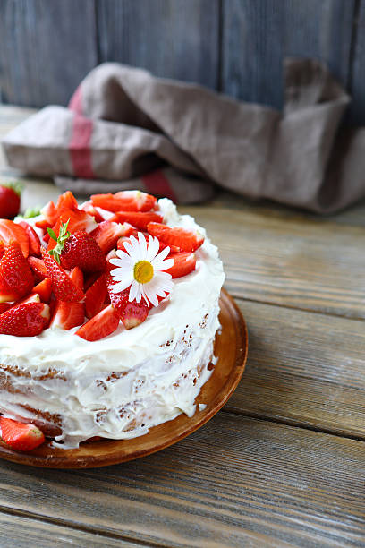 istock round cake with ripe strawberry 511280995