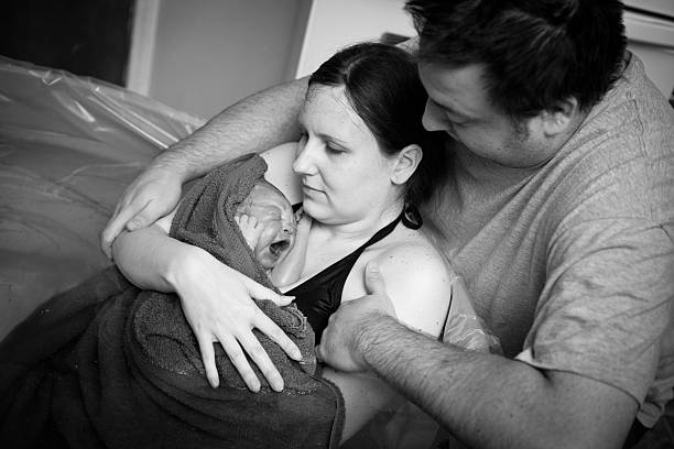 Parents Bonding With Newborn After Home Birth