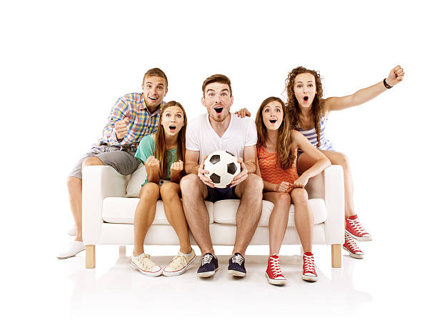 istock Group of young people on sofa with ball 511283265