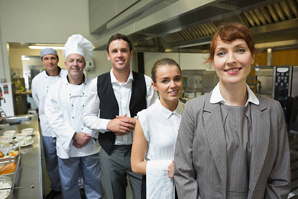 istock Nice female manager posing with the staff 511284027