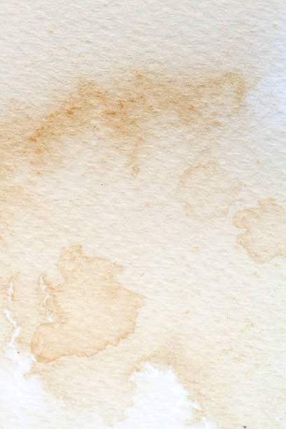 istock White yellow stained paper. Old retro letter texture. 511298678
