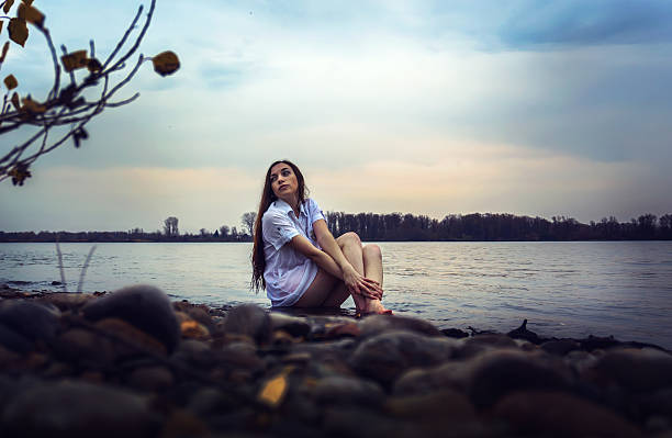 istock Pretty Woman Along the Riverside. 511299570