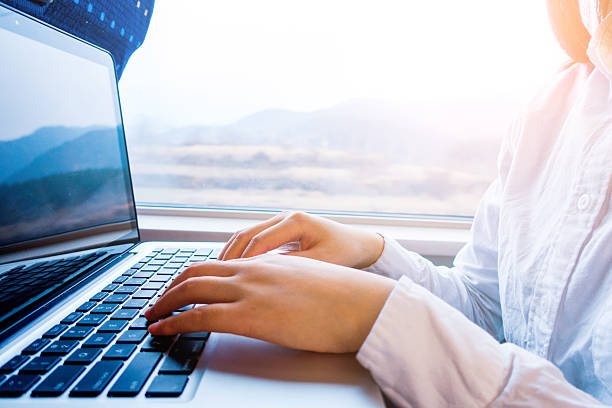 istock Woman typing on laptop 511300268