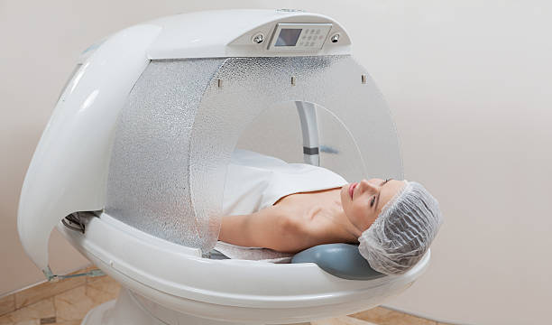 istock Woman in capsule at spa salon 511300906
