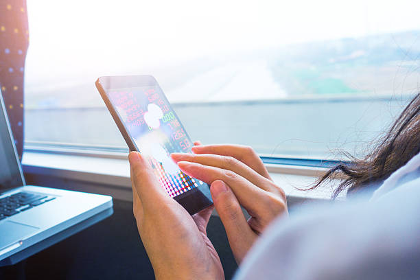 istock Analyzing stock market on mobile phone 511302050