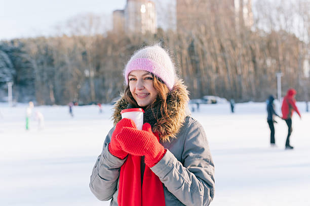 istock Woman holding winter cup close up 511302690