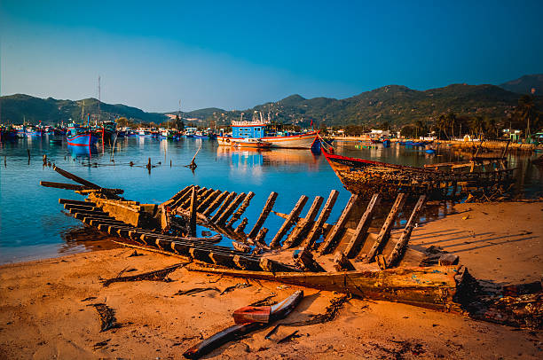Ninh Thuan, Vietnam - February 16, 2015: Old wooden ship in Vinh Hy Bay.
