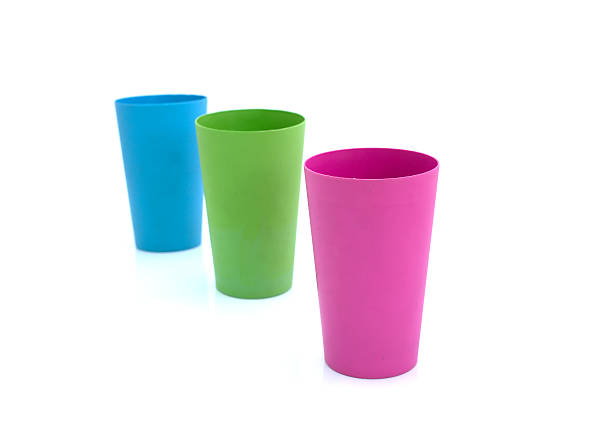 istock Plastic glass of various color isolated on white background 511304128
