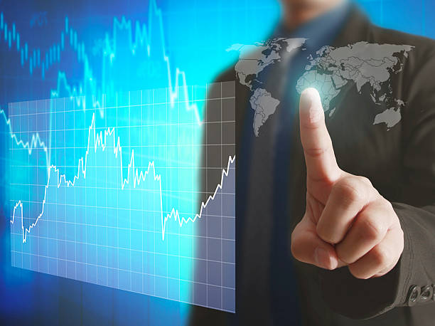 istock Businessman with financial symbols coming 511305246