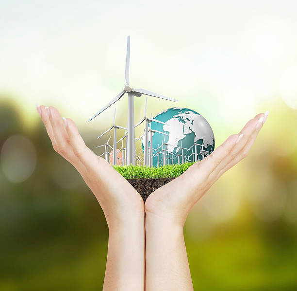 istock wind turbines in the hand 511305386