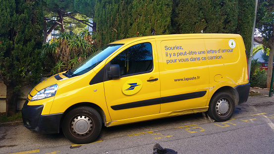 Roquebrune-Cap-Martin, France - October 30 2015: Yellow Citroen Nemo Combi, Car of the French Post Service 
