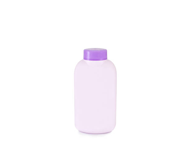 istock Plastic bottles of talcum powder on white background. 511308878