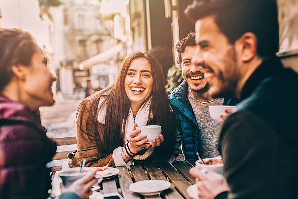 istock Group of friends talking and laughing 511310010
