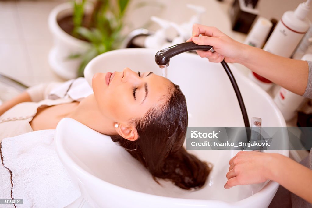 Young Woman Washing Hair In Salon Stock Photo - Download Image Now - Hair  Salon, Washing Hair, Washing - iStock