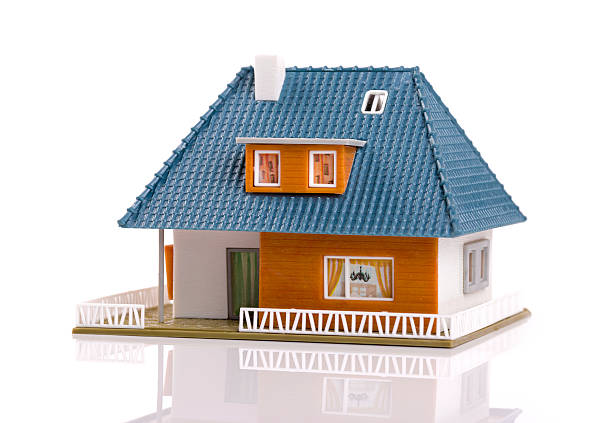 istock family house - plastic scale model, isolated on white 511311772