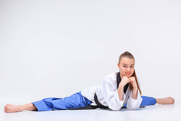 istock The karate girl with black belt 511312644