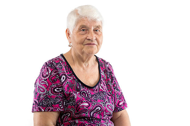 istock Sitting elderly lady with white hair 511315872