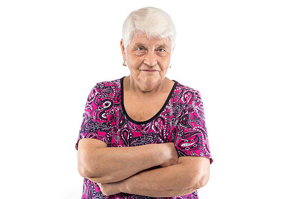 istock Elderly lady with arms crossed 511316516
