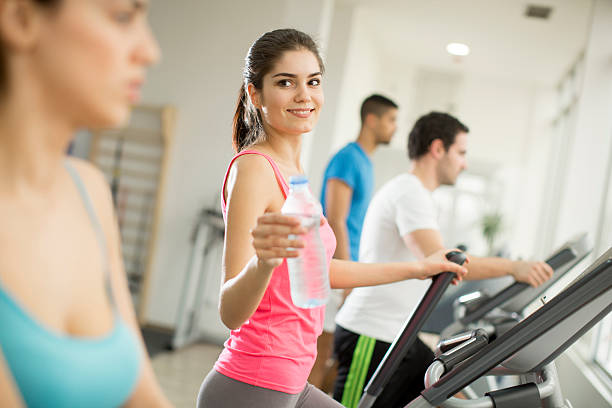 istock Young people in the gym 511317652