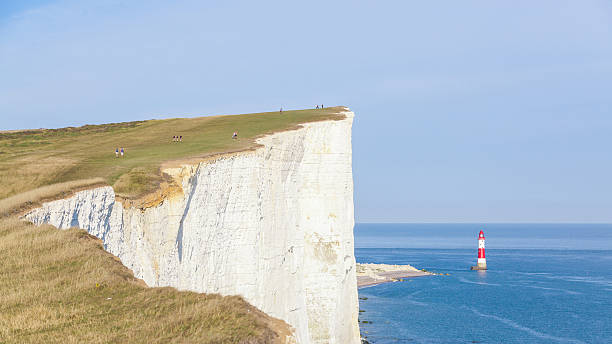 istock Cliffs, lightouse and sea in southern England 511317830