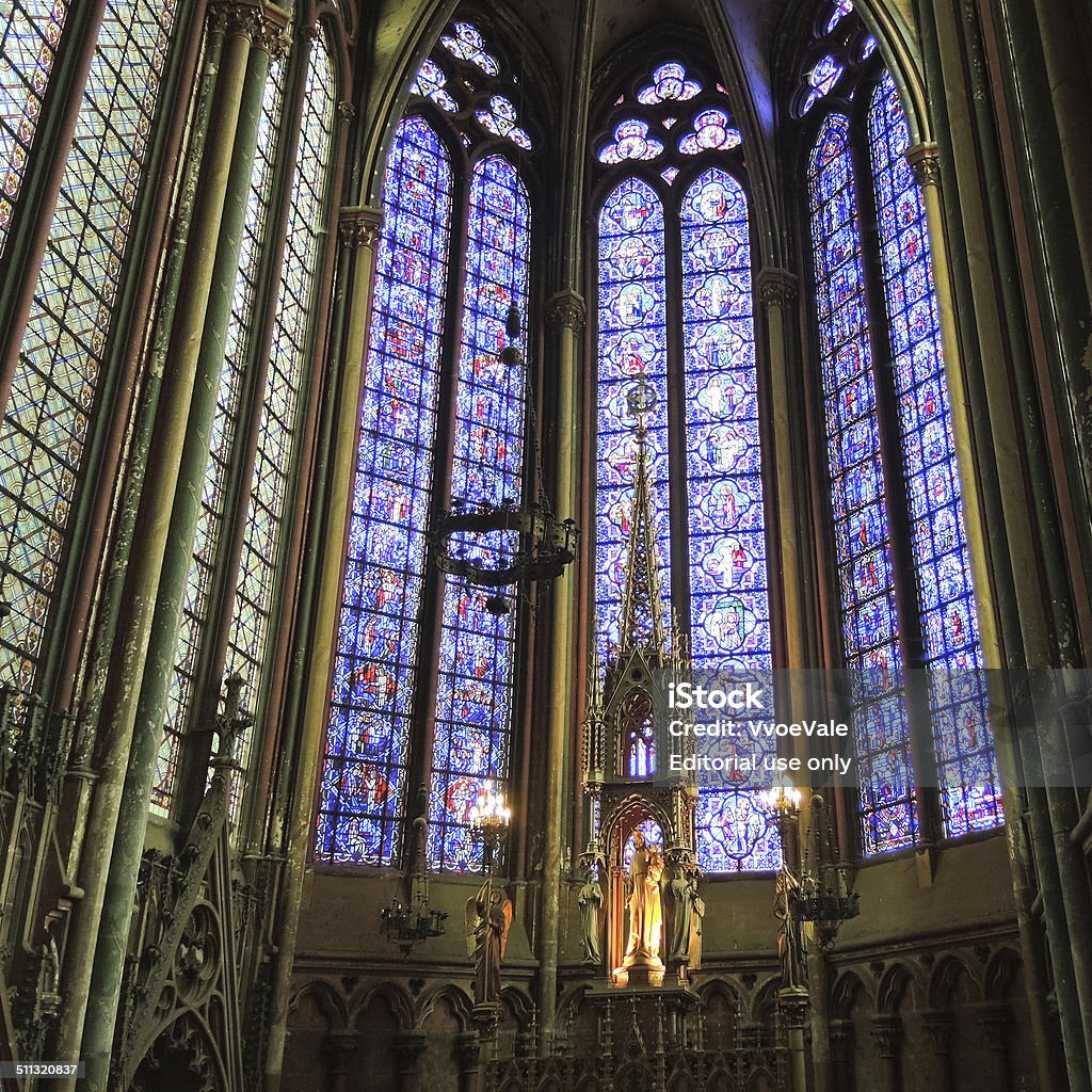 wall and stained glass window of Amiens Cathedral Amiens, France - August 10, 2014: wall and stained glass window of Amiens Cathedral. The Cathedral Basilica of Amiens was built between 1220-1270 and has been listed as UNESCO World Heritage Site Amiens Stock Photo