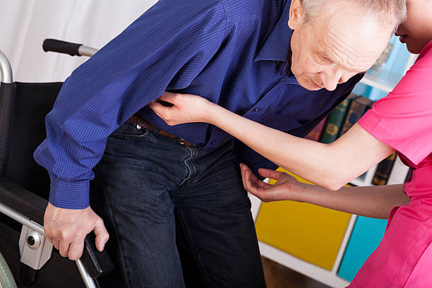 istock Geriatric patient sitting on wheelchair 511320971
