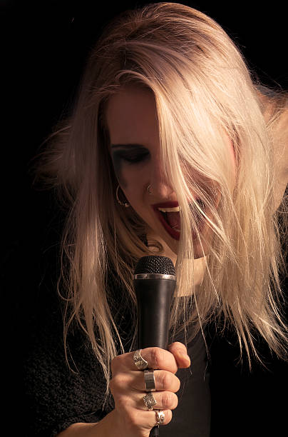 istock Blonde woman singer 511321026