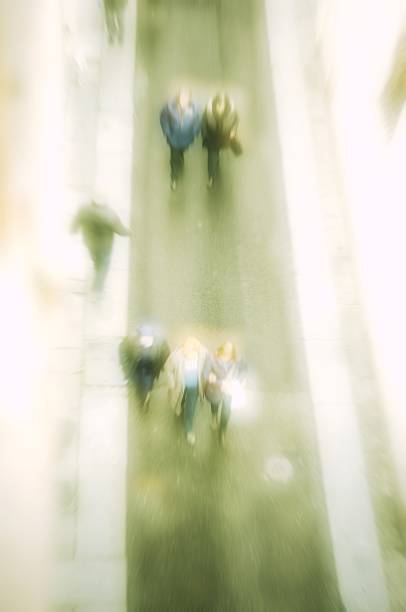 istock blurred people in the street walking shopping 511321140