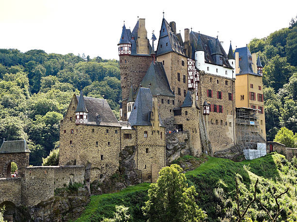 Burg Eltz, Germany - August 12, 2014: view of Castle Eltz above Mosel river, Germany. The castle is still owned by a branch of same family that lived there in the 12th century, 33 generations ago